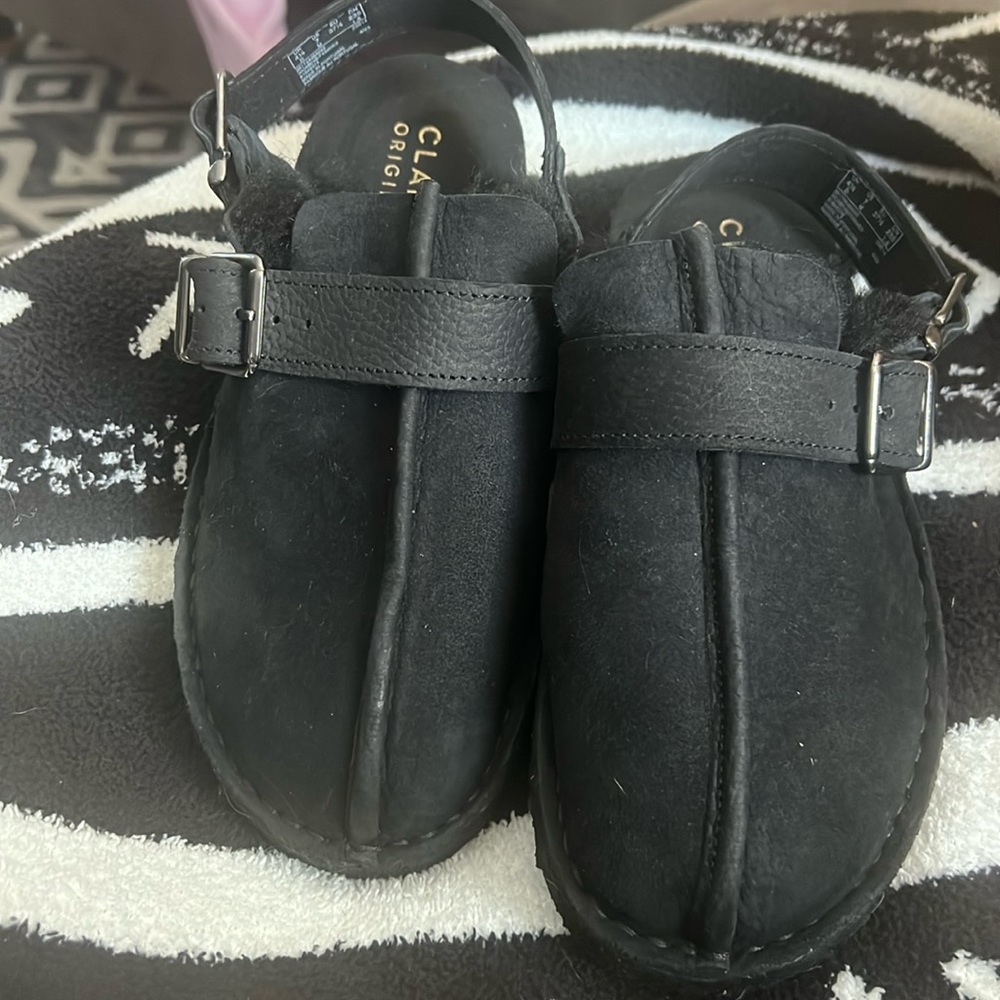 New, never worn. Clark’s trek mule sling